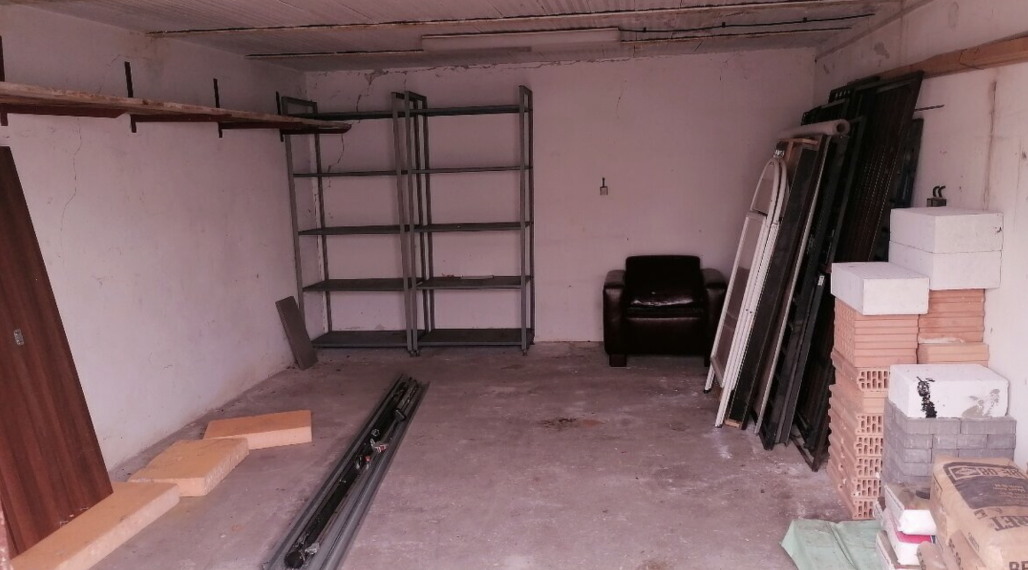 veľká murovaná garáž na predaj